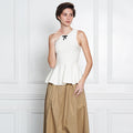 Janiah Ivory Elegance Sleeveless Peplum